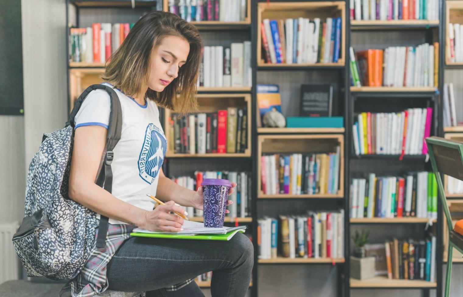 Professional remote learning setup with financial documents and computer